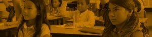 students in classroom with yellow overlay cropped